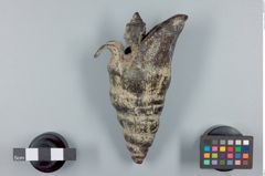 Foto (Seitenansicht) von buddistisches Amulett 1 (NHMW-ZOO-MO-0081100-ETH-114)